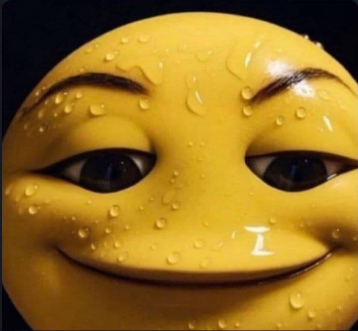 An emoji of a smug smile